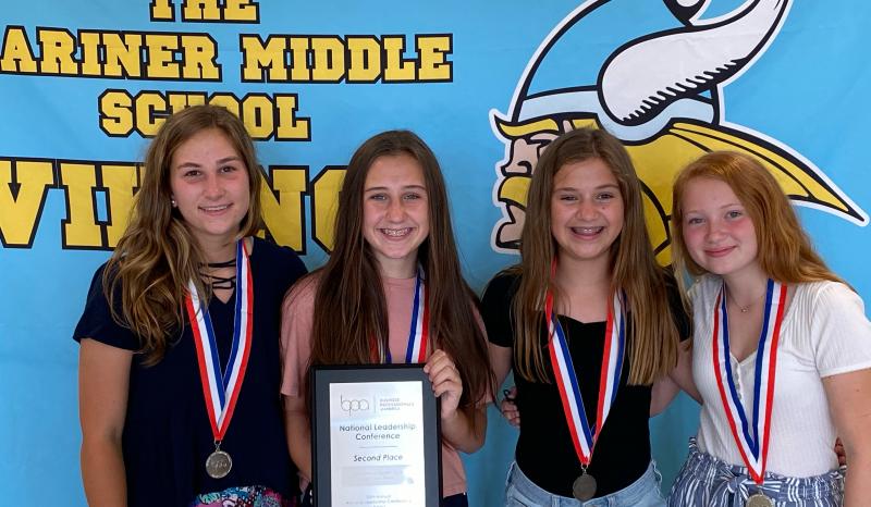 Seventh-graders (l-r) Regan Best, Audrey Hershelman, Bridgett Cole and Rylie Cathcart won second place in Delaware and second place nationally in the administrative support team category.